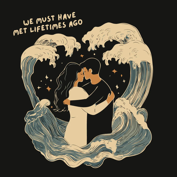 Romantic couple embracing with waves forming a heart shape