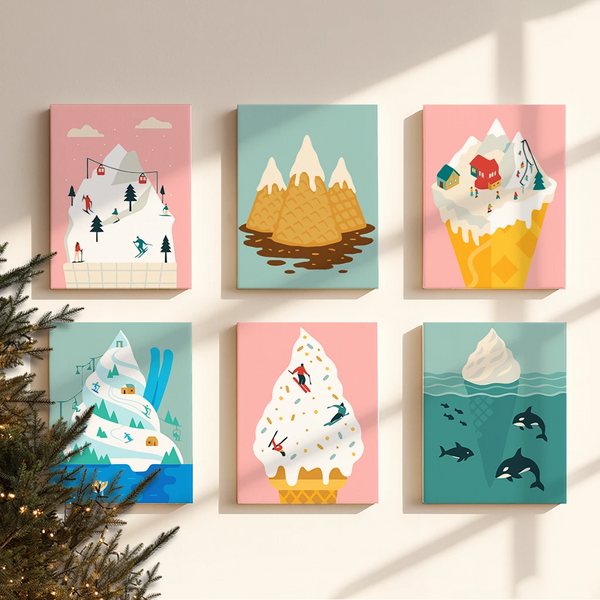 Completed Frost Cone paint by numbers canvases by Artspark showing surreal winter landscapes with snowy peaks shaped like ice cream cones — colorful and fun wall art set.