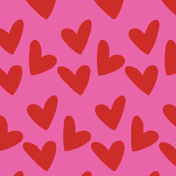 Seamless pattern of red hearts on a pink background