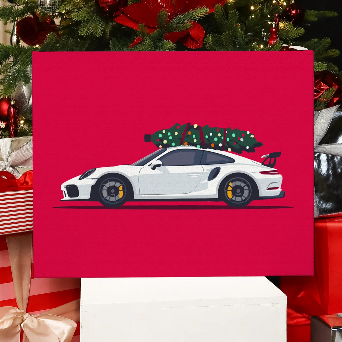 Completed Holiday Ride paint by numbers artwork showing a white sports car with a Christmas tree on top against a red background.
