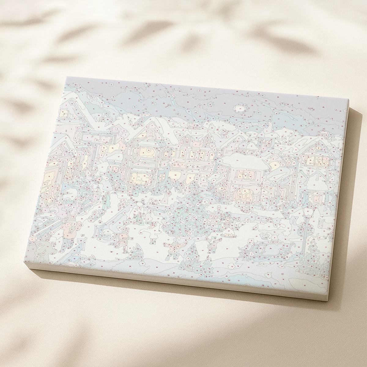 Ice Skating paint by numbers canvas showing a snowy village with people skating and festive decorations.