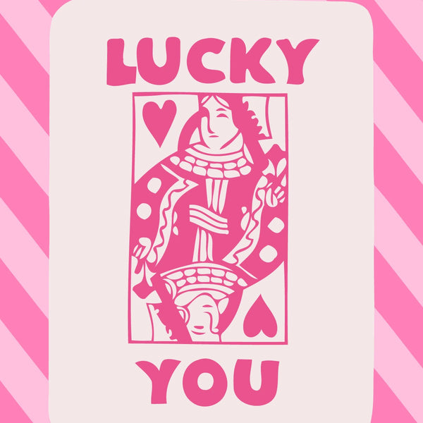 Pink queen of hearts playing card with "Lucky You" text
