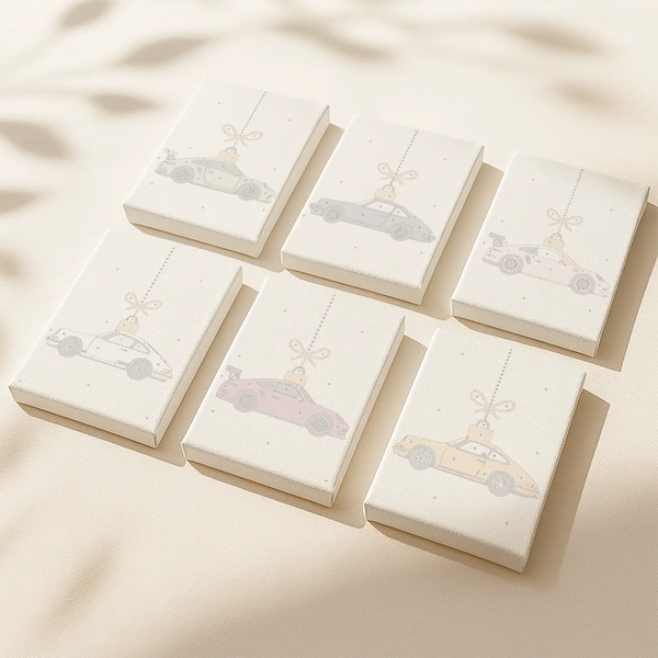 Merry Drive paint by numbers set of 6 mini canvases by Artspark showing outlined sports cars decorated as Christmas ornaments ready to paint — a playful holiday art project.