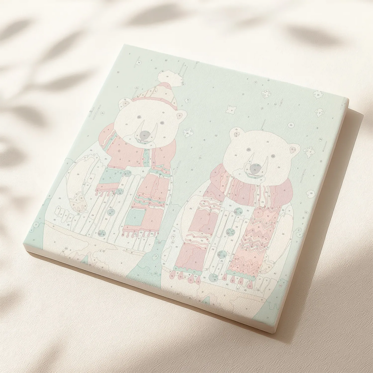 Polar Bears paint by numbers canvas showing two cute polar bears wearing festive scarves in the snow.