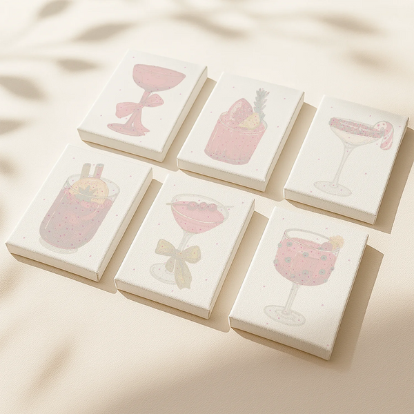 Red Sip paint by numbers set of 6 mini canvases by Artspark featuring festive cocktails in red tones with bows, berries, and candy canes ready to paint.
