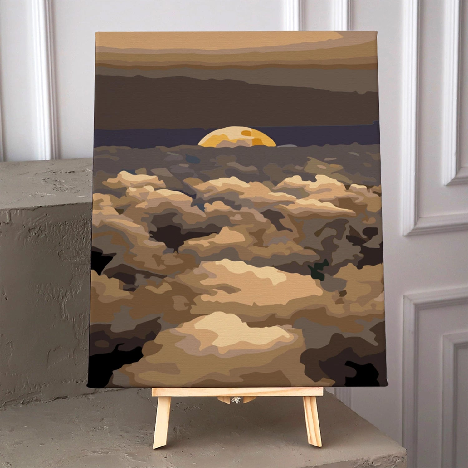 Golden moon rising above dark clouds in atmospheric night painting