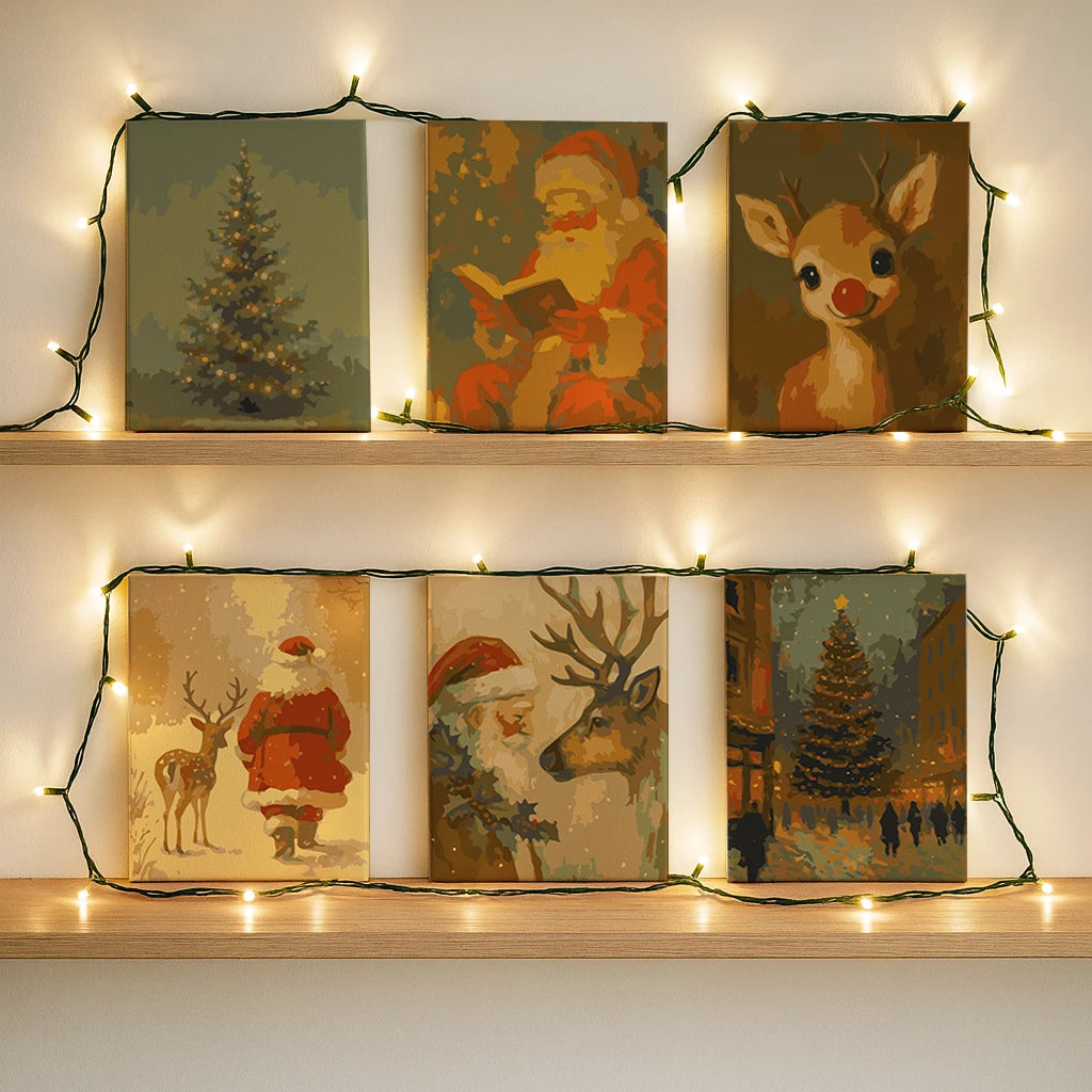 Completed Santa Story paint by numbers mini canvases by Artspark featuring Santa Claus, reindeer, and festive Christmas art.