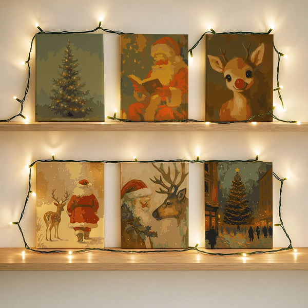 Completed Santa Story paint by numbers mini canvases by Artspark featuring Santa Claus, reindeer, and festive Christmas art.