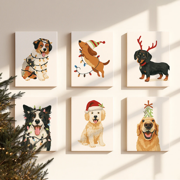 Completed Santa Tails paint by numbers canvases by Artspark showing festive holiday dogs in Santa hats, Christmas lights, and reindeer ears — cute wall art for pet lovers.