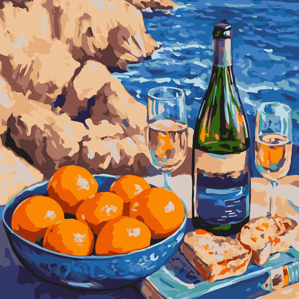 Still life of wine, oranges, and bread by the sea