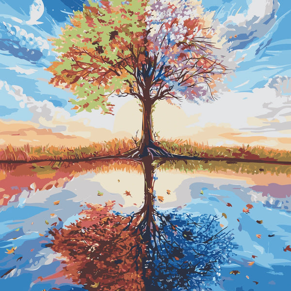 Tree representing four seasons reflected in a tranquil lake
