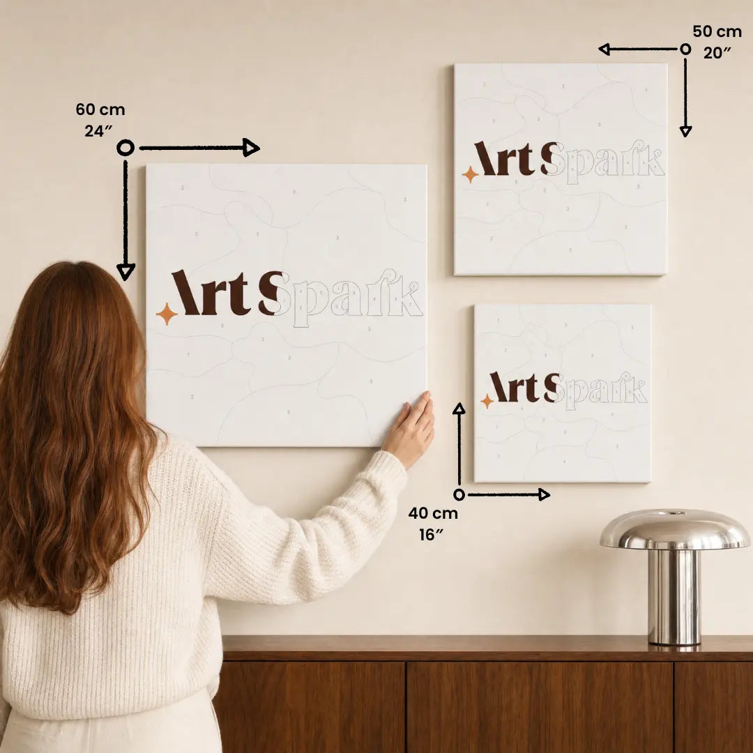 Canvas sizes compared on a wall