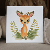 Cute watercolor painting of a baby deer surrounded by greenery