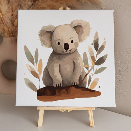 Cute watercolor painting of a baby koala sitting on a log