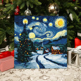Completed Winter Village paint by numbers by Artspark showing a snowy Christmas village with a starry sky and festive lights.