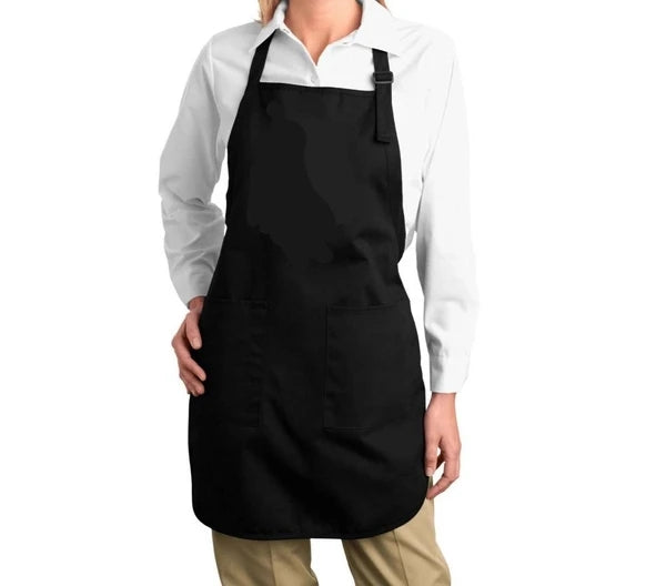 Black adjustable art apron with two front pockets, worn by a person – perfect for painting, crafting, or creative sessions
