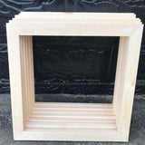 Stack of oak wood frames for 16x20 inch paint-by-numbers canvases – natural finish