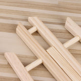 Close-up of folding pine easel – lightweight natural wood