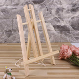 Assembled pine easel on desk with flowers – great for paint-by-numbers
